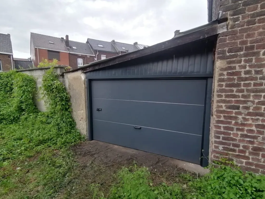 Porte de garage sectionnelle motorisée, réalisation Vertessen